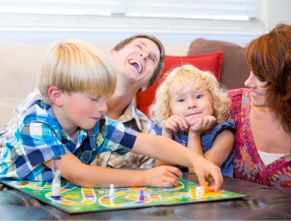 Family playing board game 