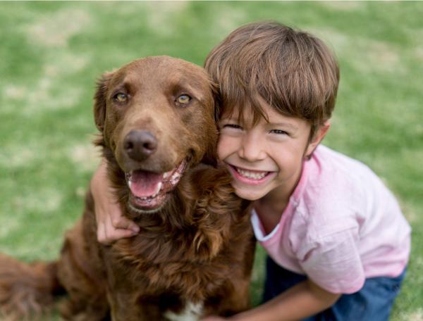 Boy with pet dog